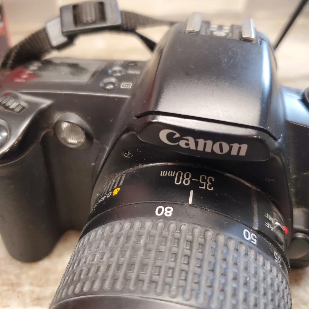 Canon EOS Elan 7 and EOS Rebel G With Lens And Accessories (see notes)